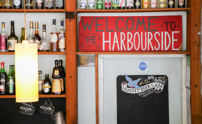 Welcome sign and bar at No.1 Harbourside